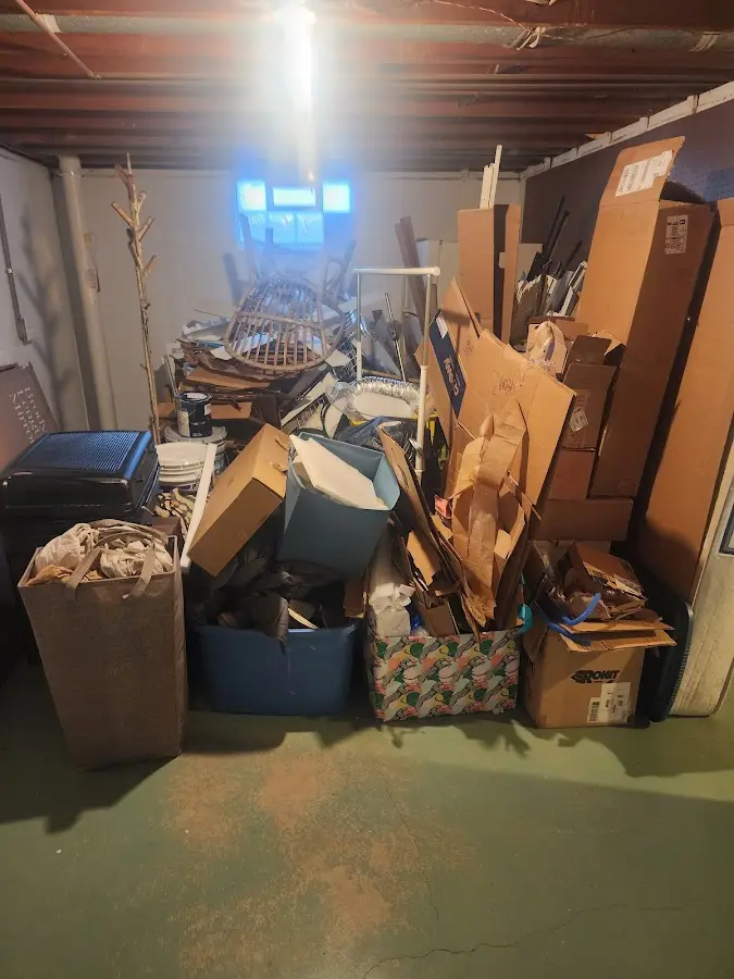 Roll-off dumpster container at job site for Construction Dumpster Rental in Saddle Brook